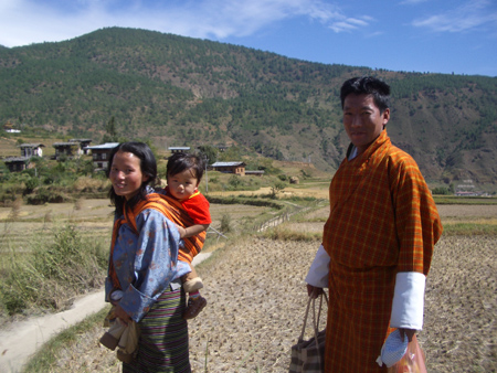 Parents praying in thanks for a child